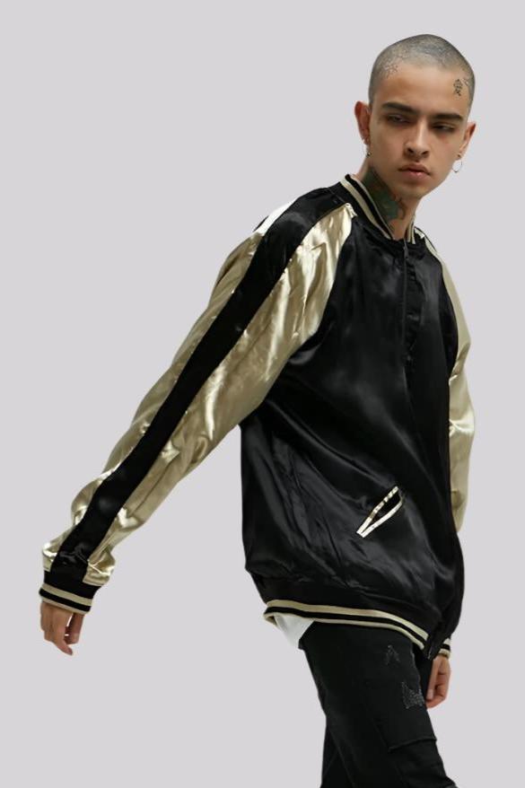 Model wearing the reversed Dragon's Sakura sukajan jacket from Sukajan Mall, showing unique design details.